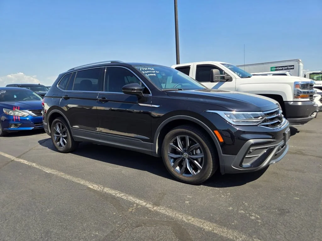 Used 2022 Black Volkswagen SE image 1