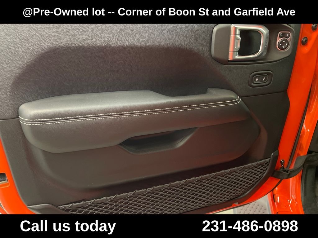Used 2018 Orange Jeep Unlimited Sahara image 15