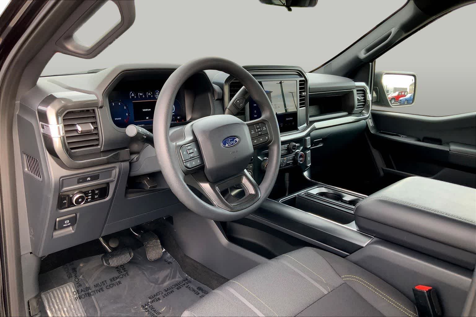 Used 2025 Agate Black Metallic Ford STX image 27