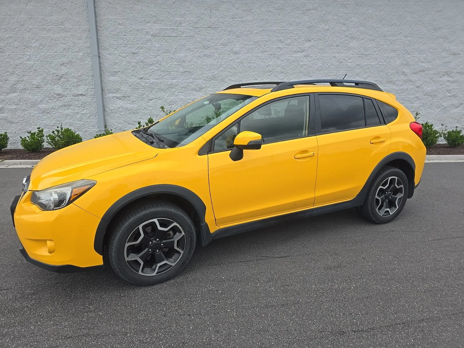 Used 2015 Sunrise Yellow Subaru 2.0i Premium image 1
