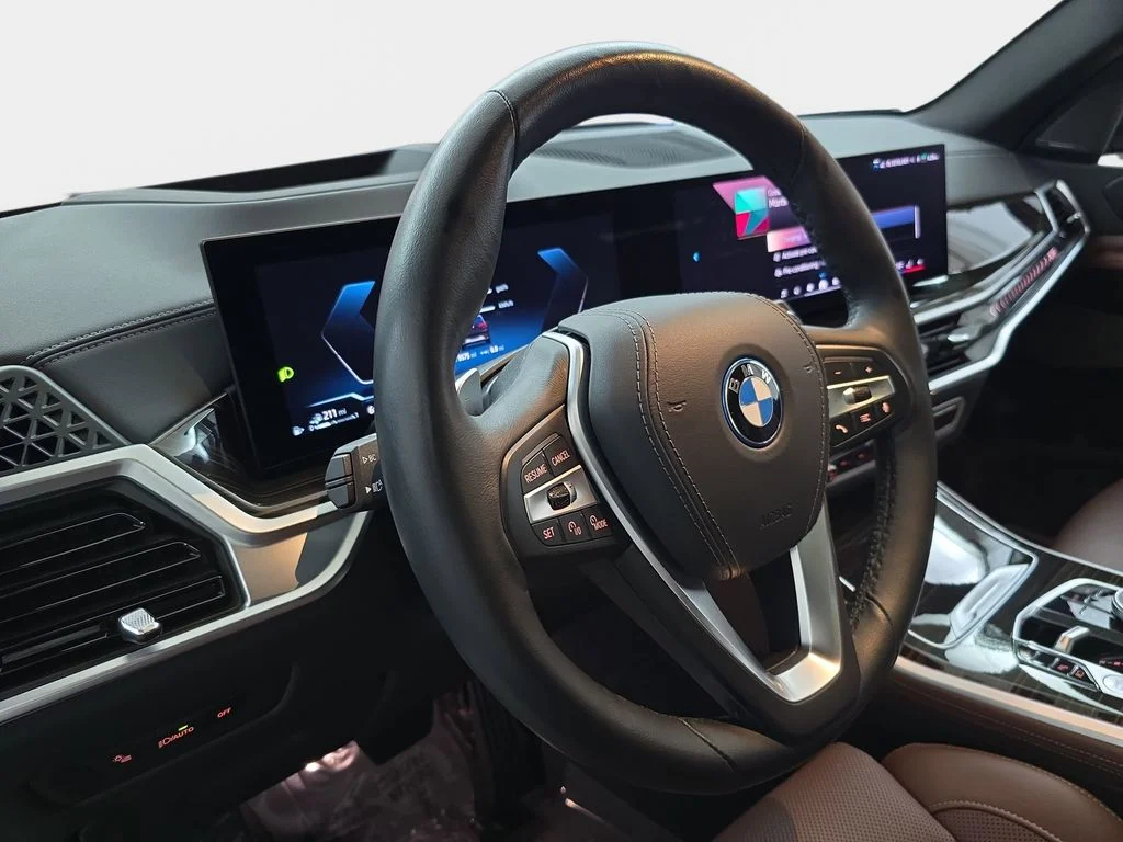 Used 2025 Black Sapphire Metallic BMW xDrive50e image 19