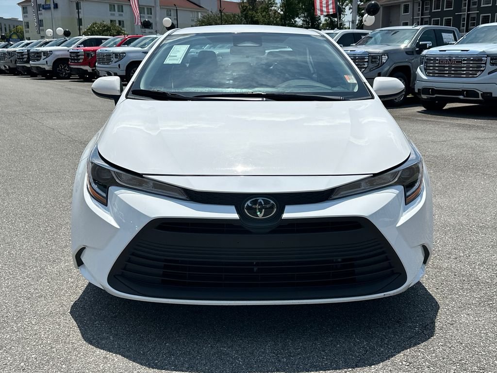 Used 2025 White Toyota LE image 2