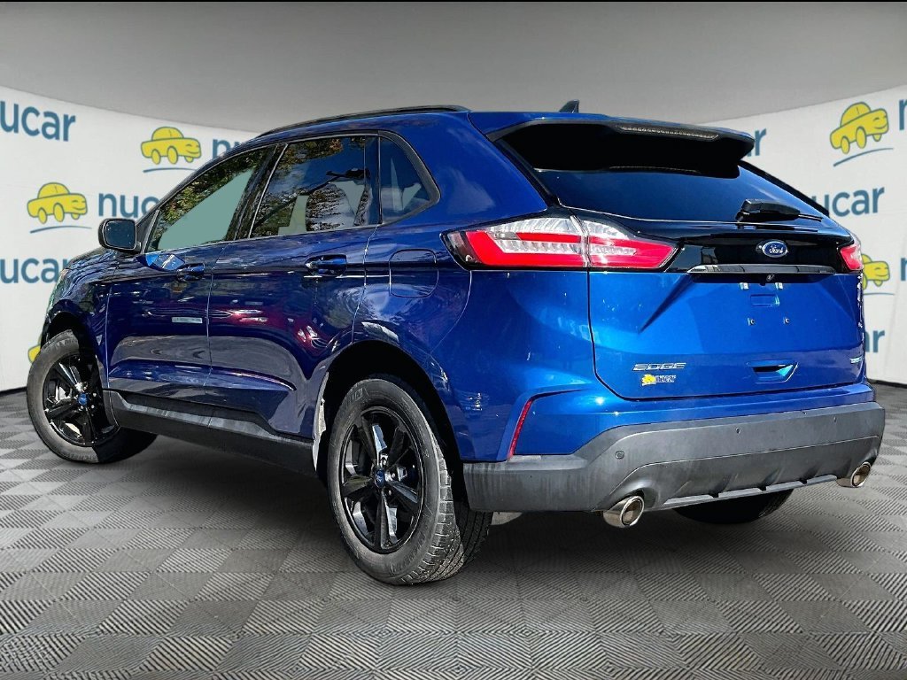 Used 2020 Blue Metallic Ford SE image 4