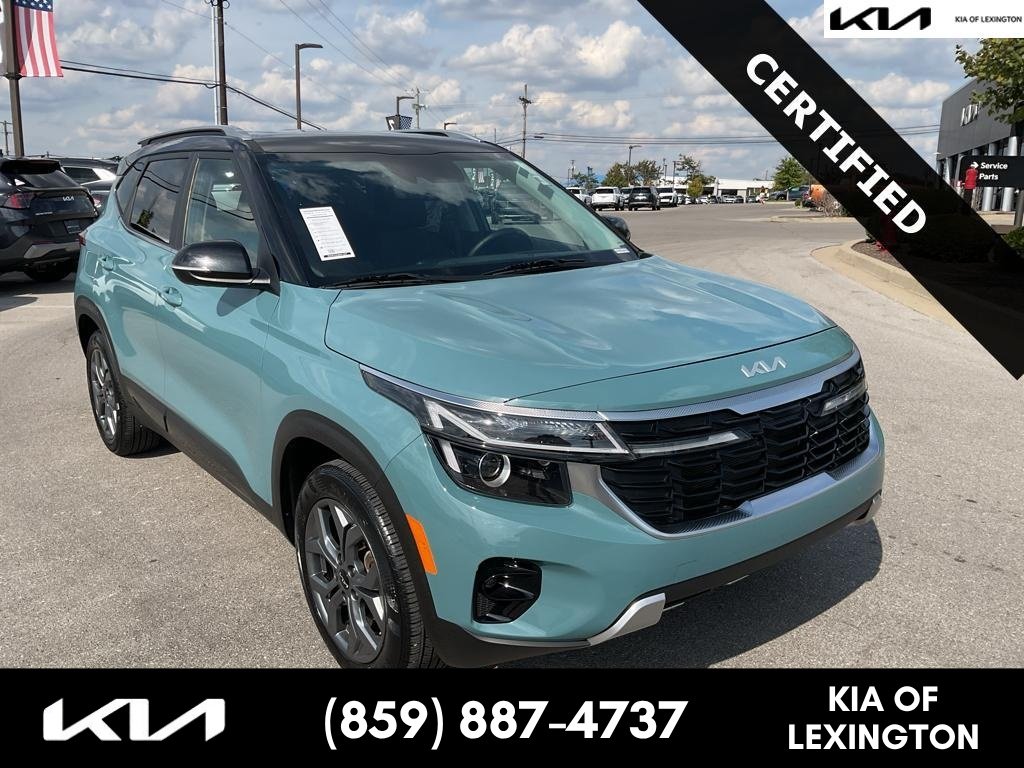 Used 2024 Pluton Blue/Black Roof Kia S image 1