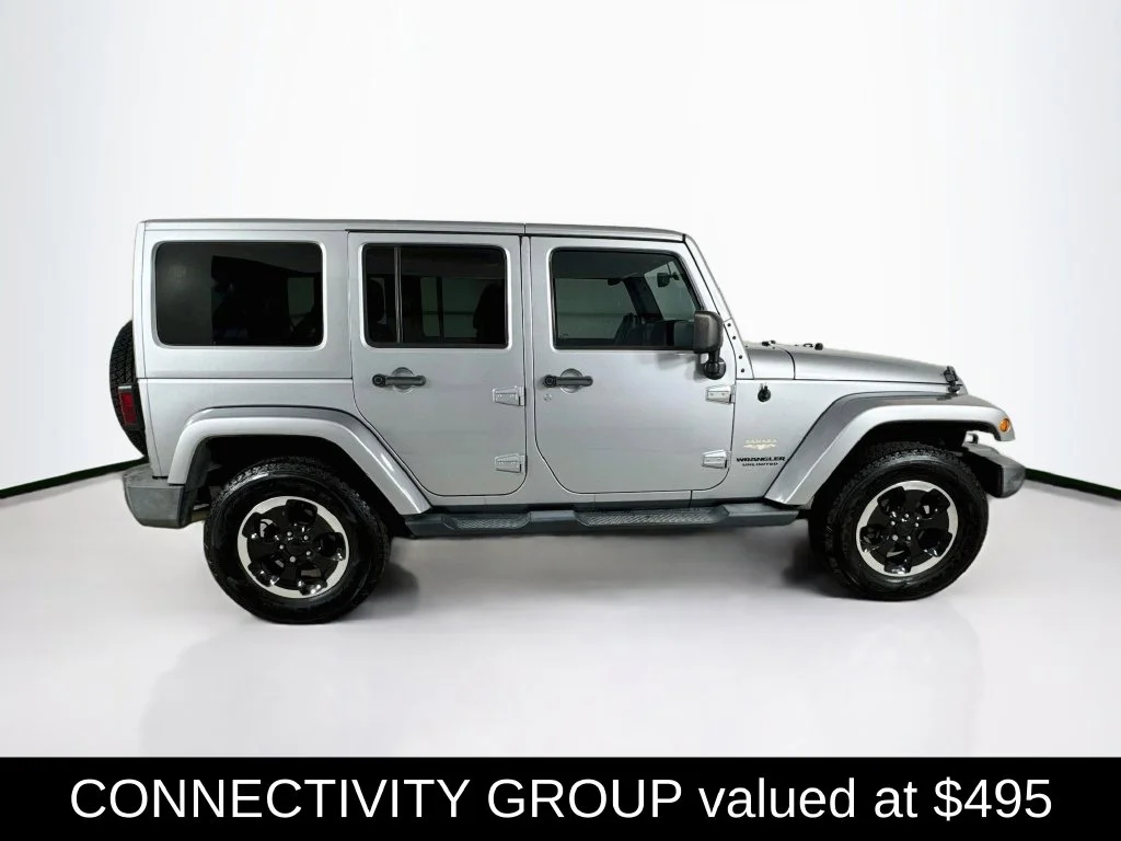 Used 2013 Billet Metallic Clearcoat Jeep Unlimited Sahara image 9