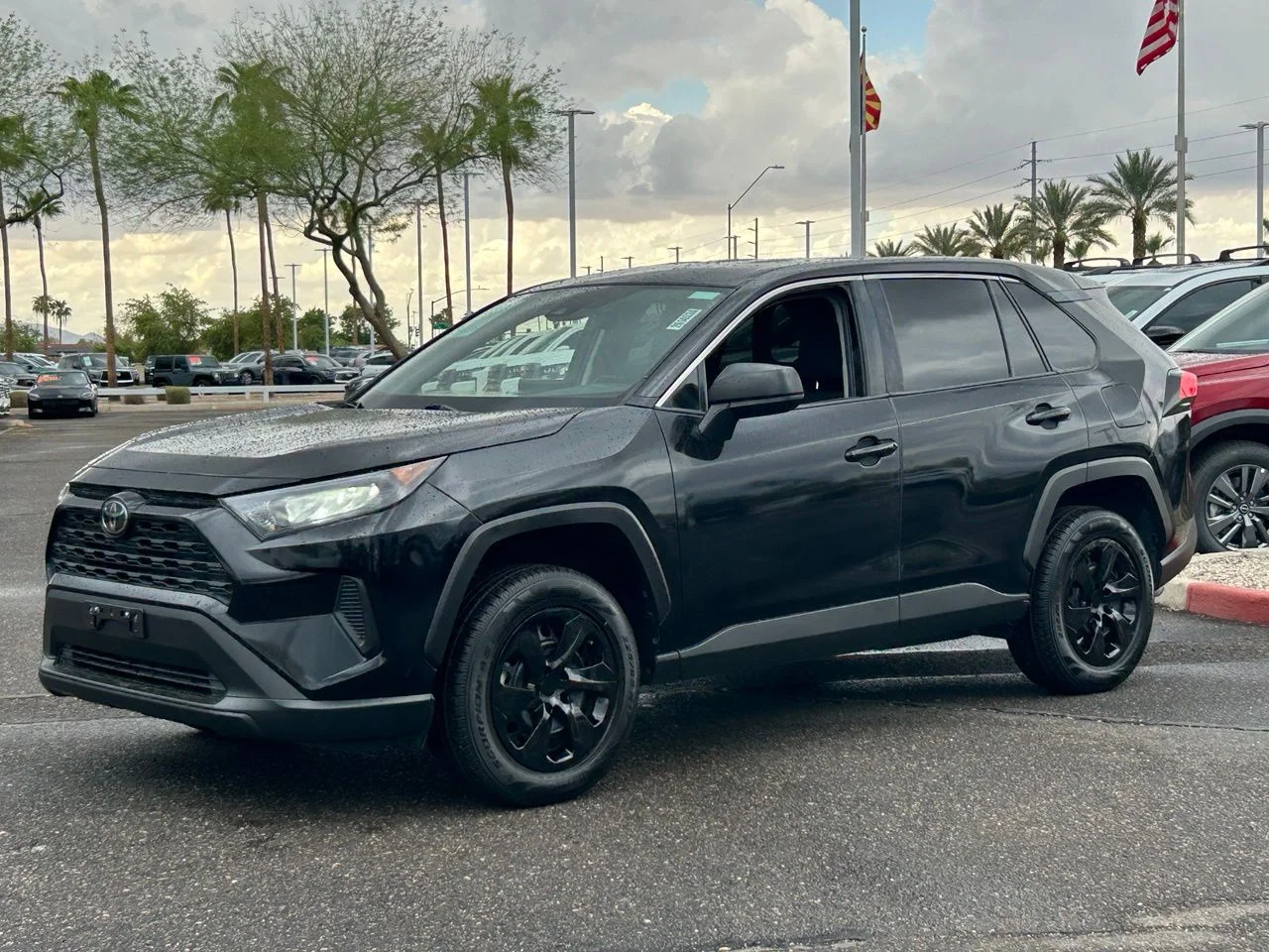 Used 2022 Midnight Black Metallic Toyota LE image 1