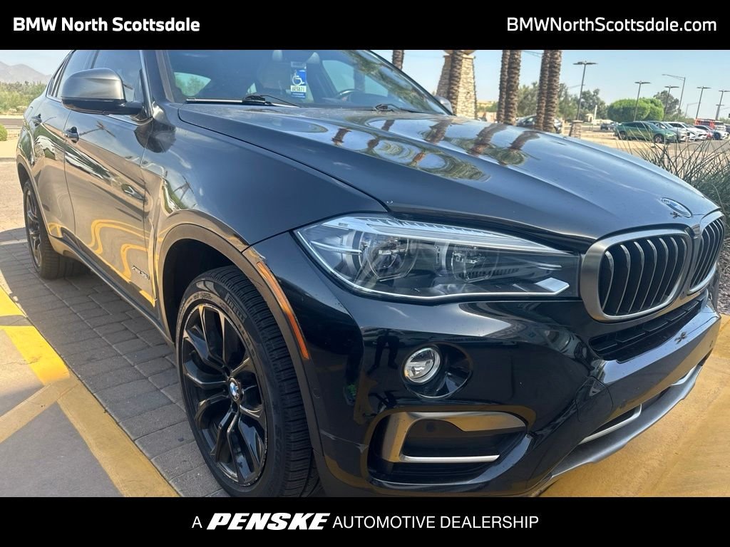 Used 2018 Black Sapphire Metallic BMW xDrive35i image 1