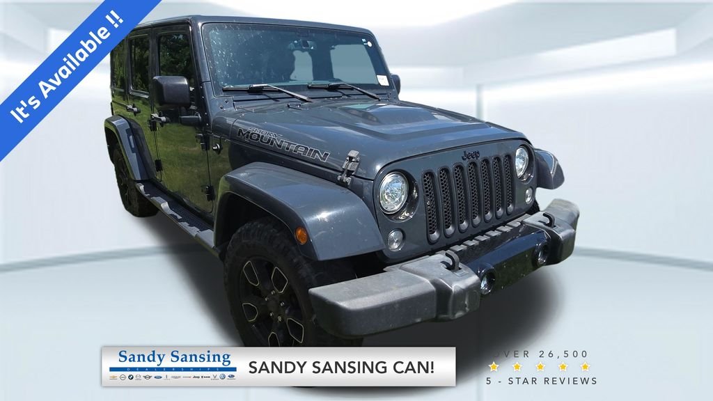 Used 2017 Black Jeep Unlimited Sahara image 1