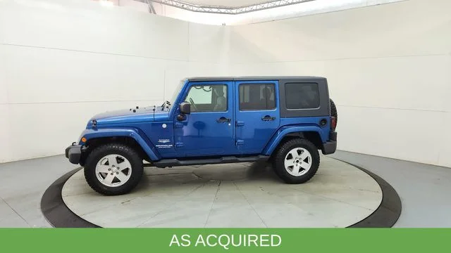 Used 2010 Blue Jeep Unlimited Sahara image 5