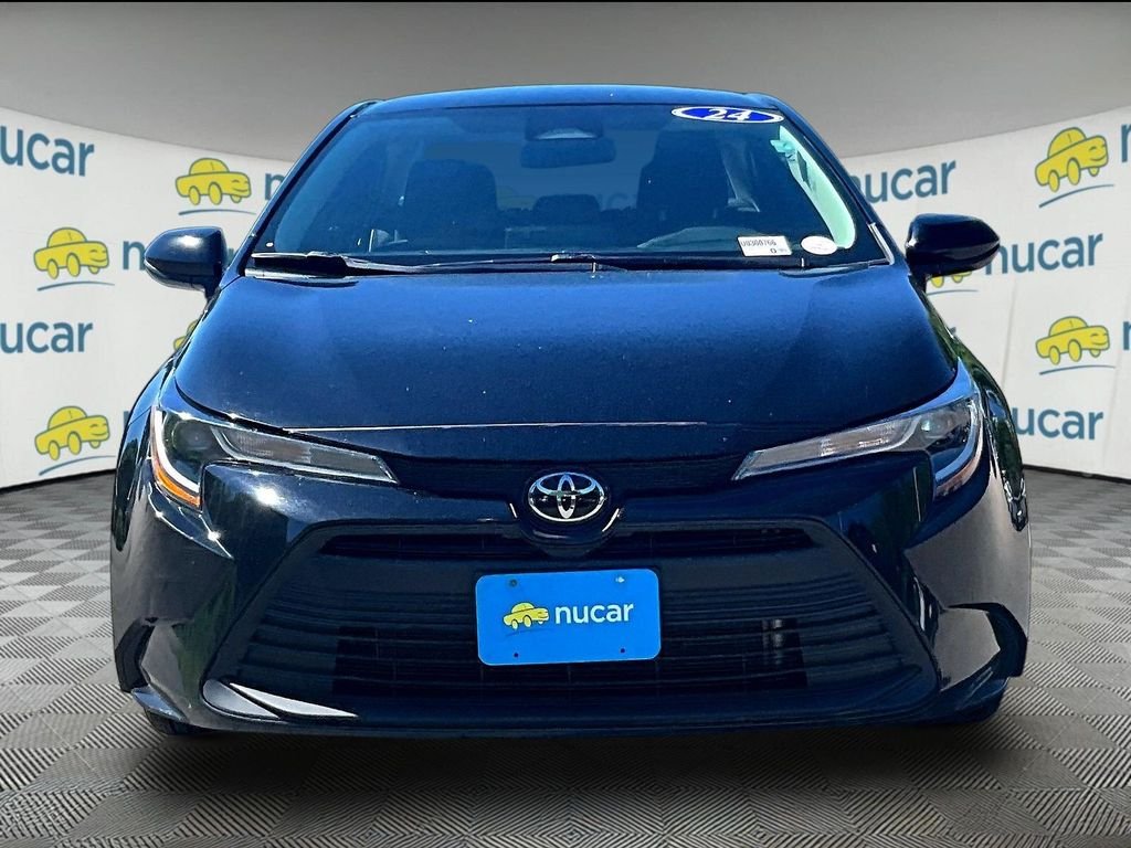 Used 2024 Black Toyota LE image 2