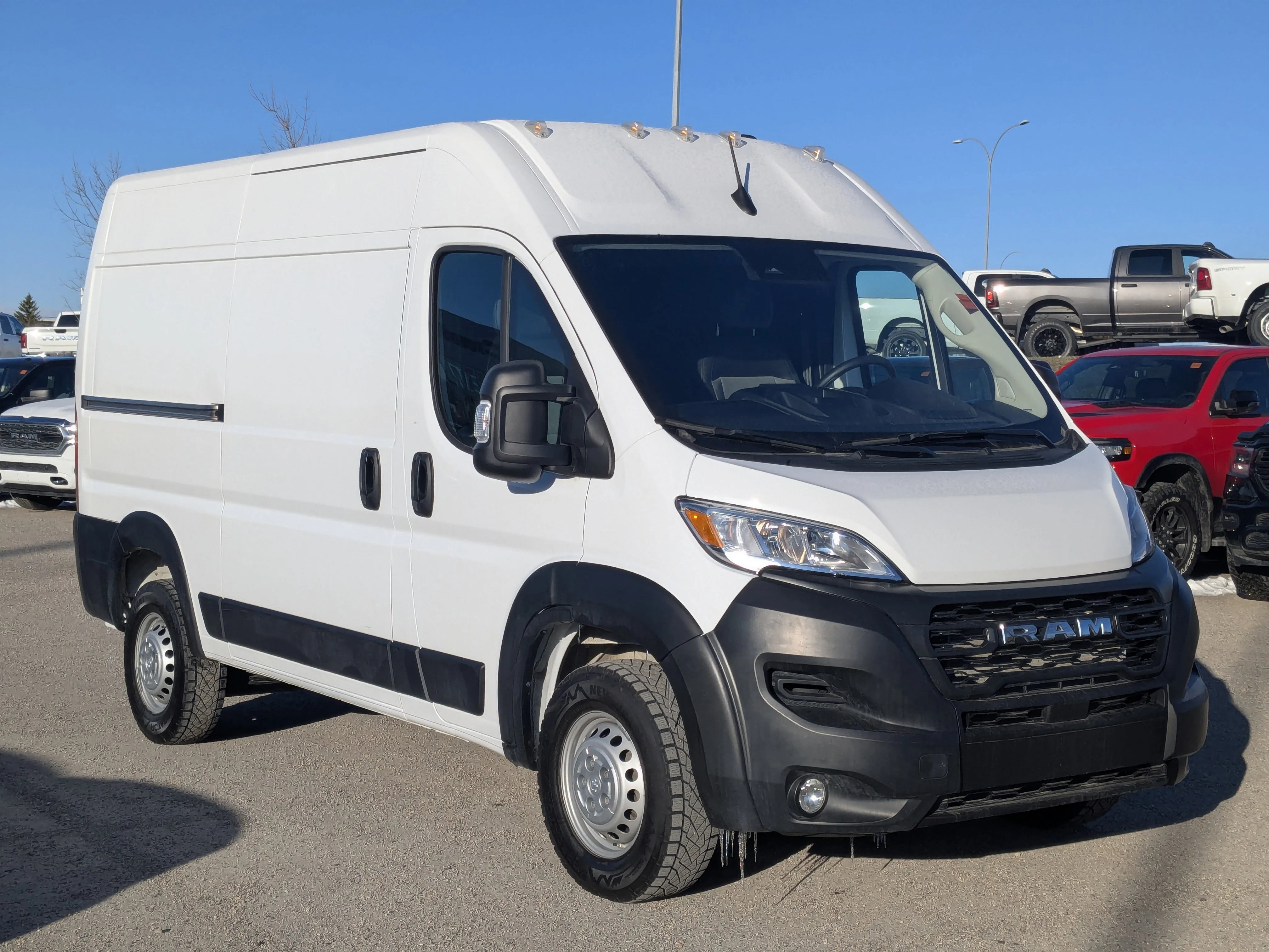 Used 2025 White RAM Tradesman - - Pkg 22B - Convenience Grp - Mopar Cargo Mat - Wall Paneling & More image 2