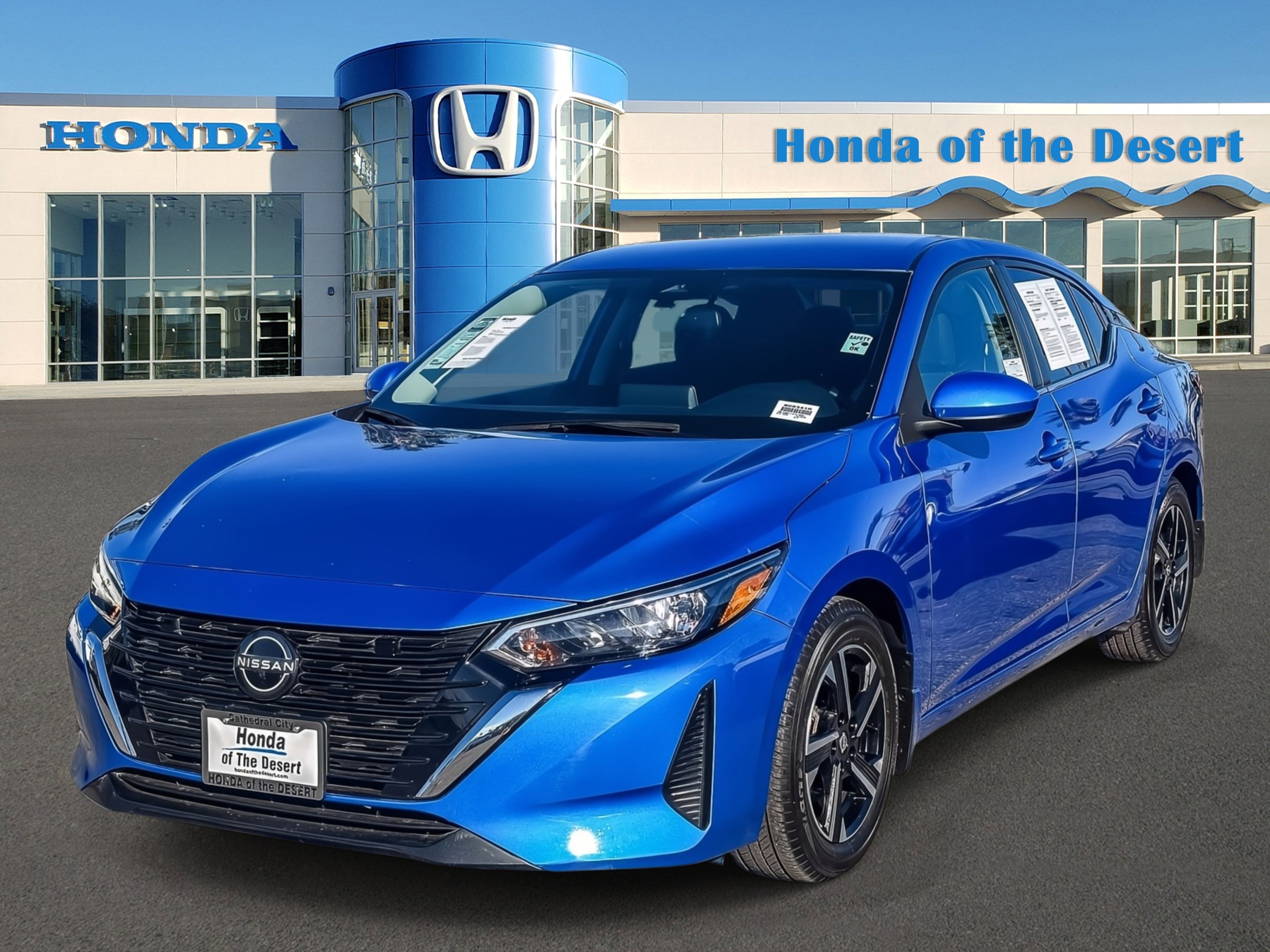 Used 2024 Electric Blue Metallic Nissan SV image 3