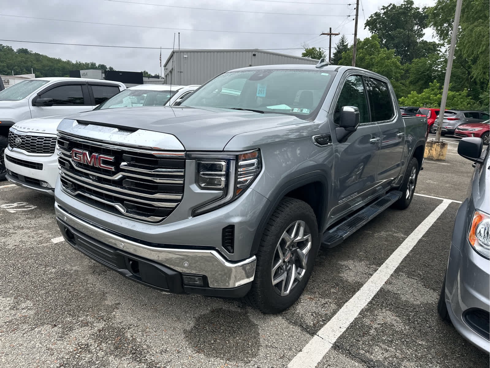 Used 2024 Sterling Metallic GMC SLT image 1