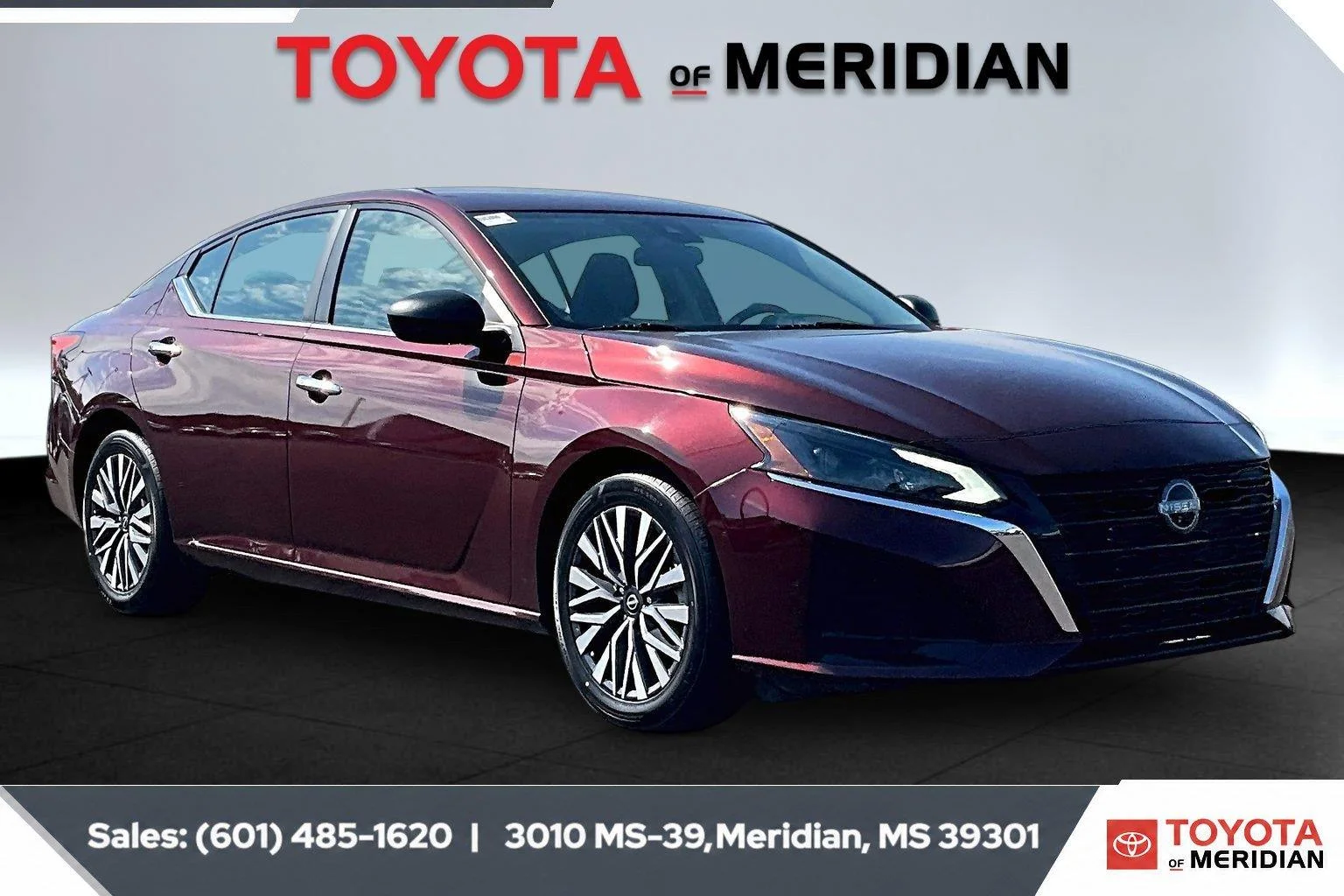 Used 2025 Garnet Pearl Metallic Nissan SV image 1