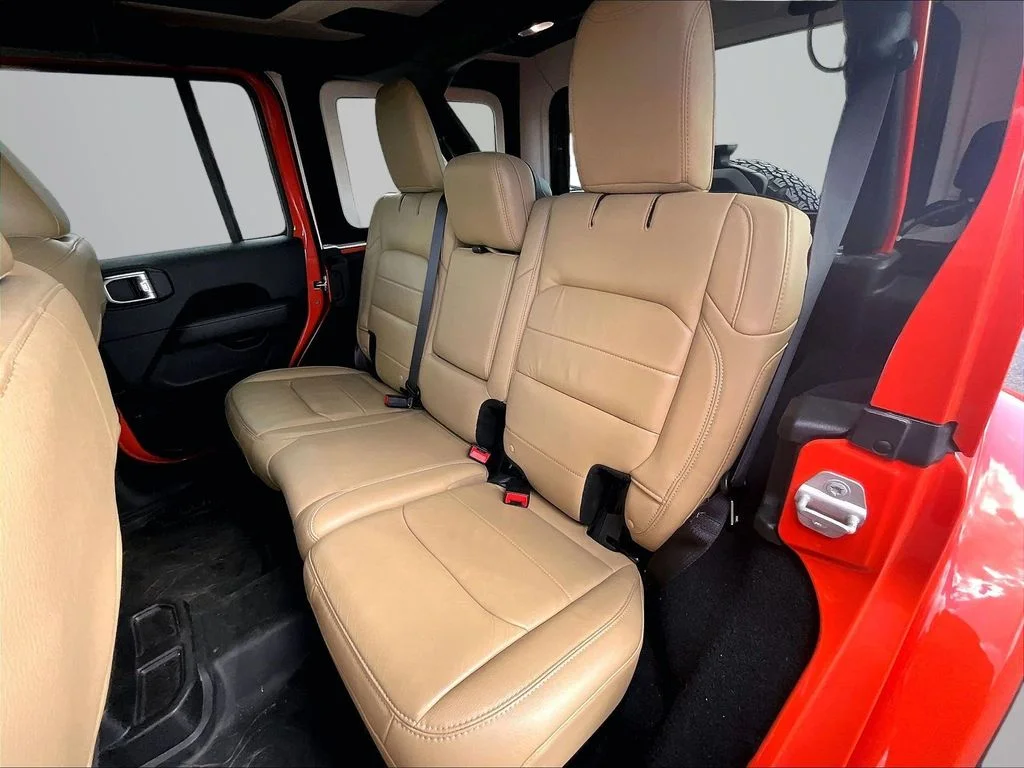 Used 2018 Orange Jeep Unlimited Sahara image 25