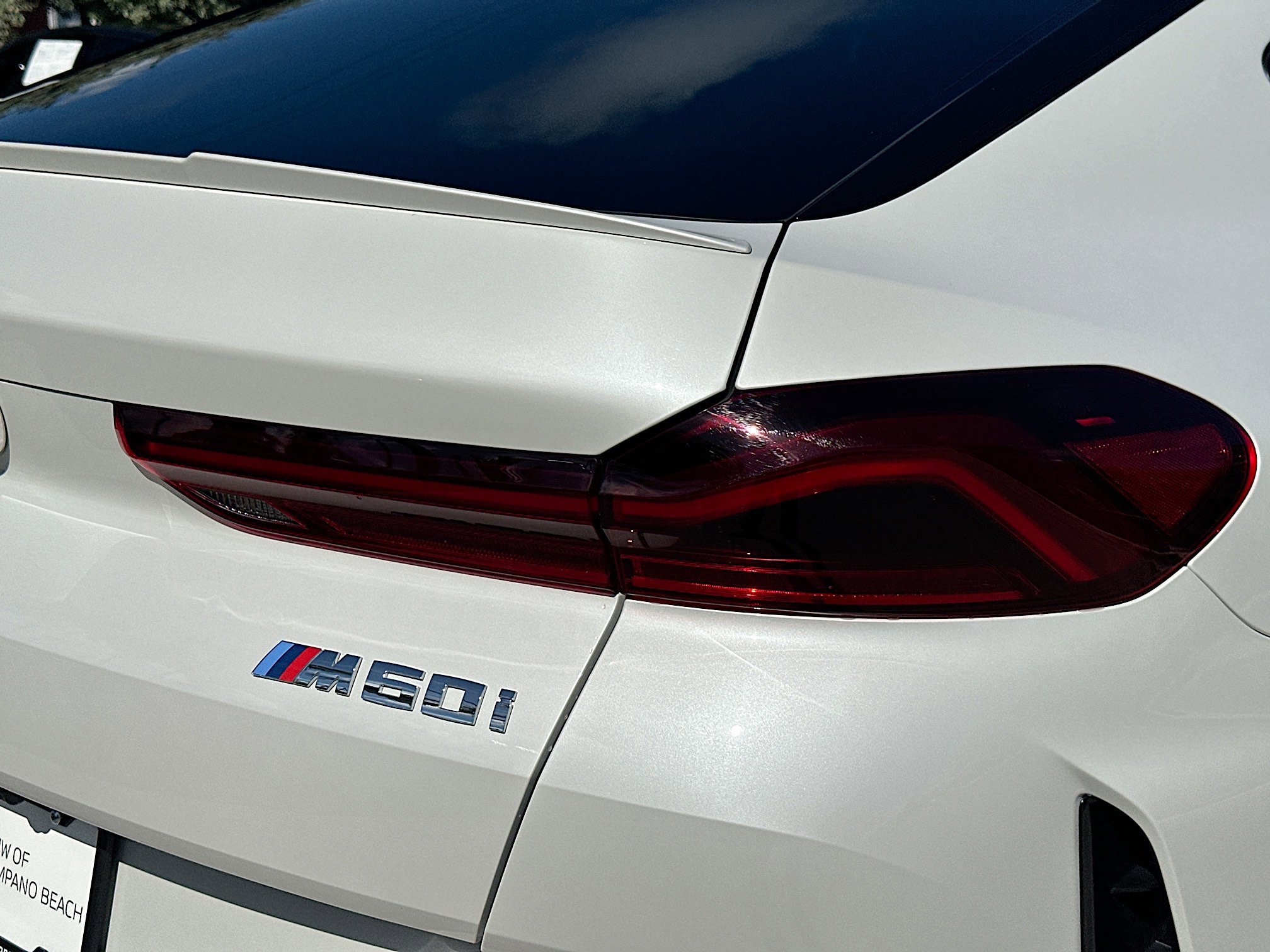 Used 2026 White Metallic BMW M60i image 24