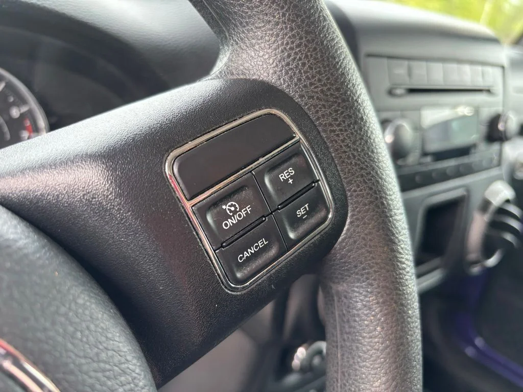 Used 2017 Purple Jeep Unlimited Sport image 13