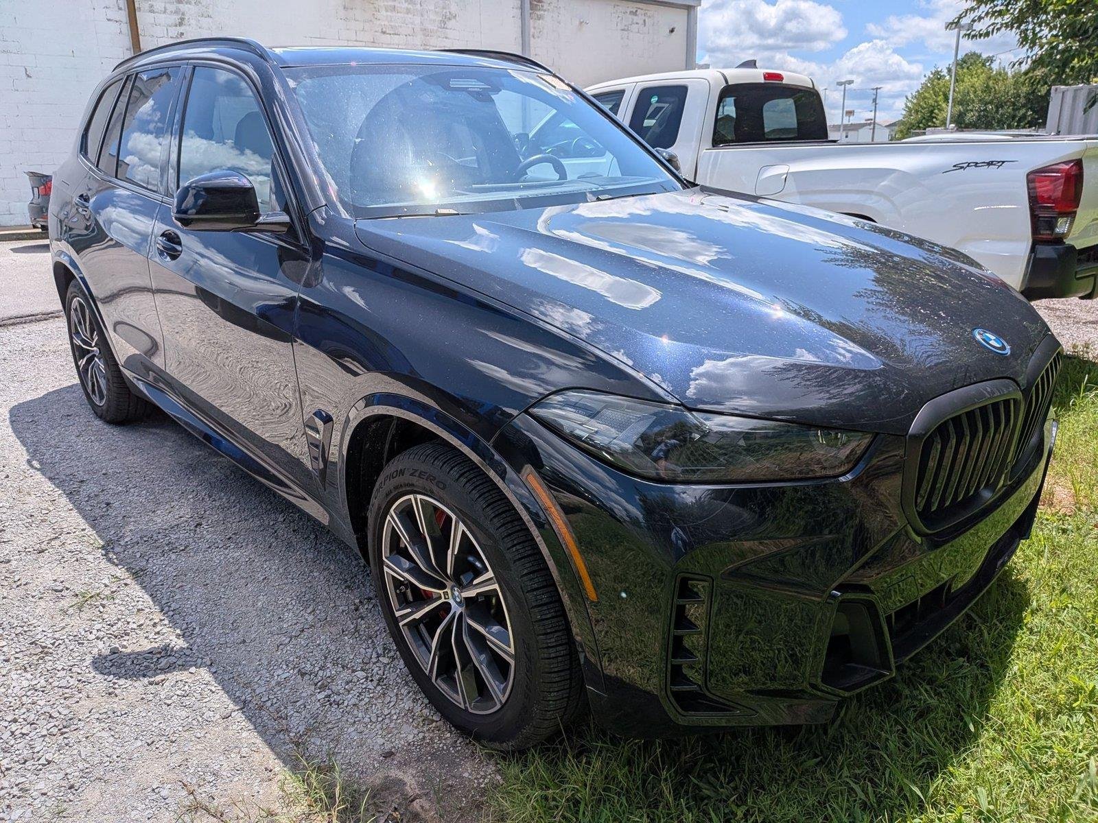 Used 2024 Carbon Black Metallic BMW xDrive50e image 3