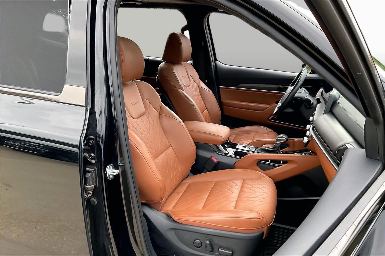 Used 2025 Ebony Black Kia SX-Prestige X-Pro image 9