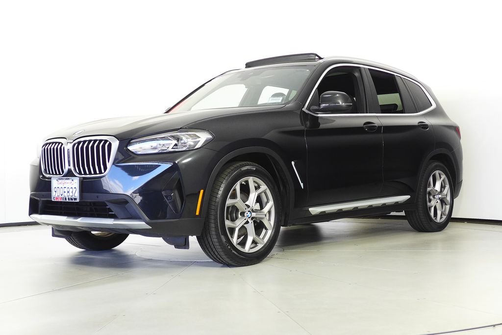 Used 2023 Black Sapphire Metallic BMW sDrive30i image 2