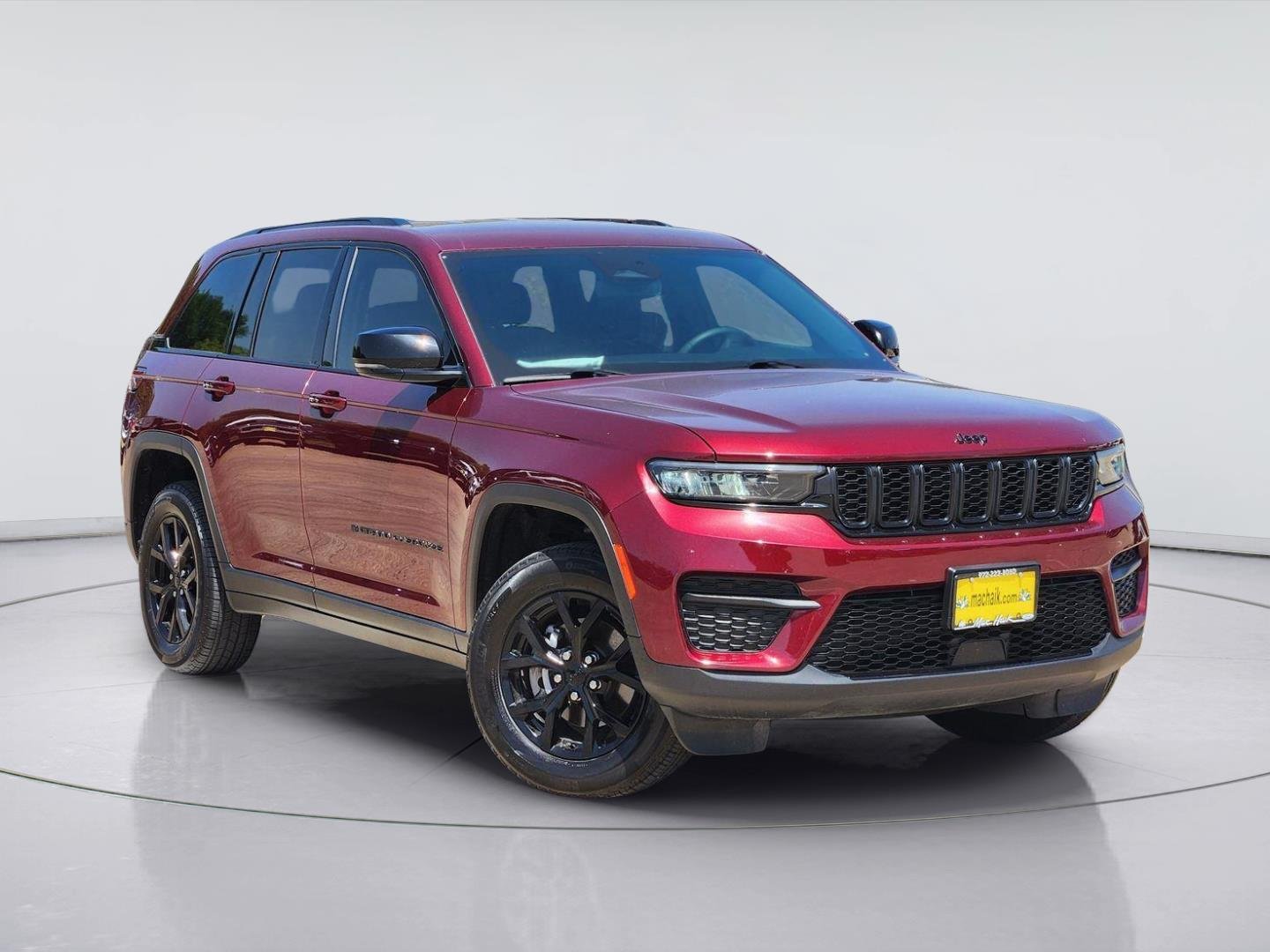 Used 2024 Velvet Red Pearlcoat Jeep Altitude image 1