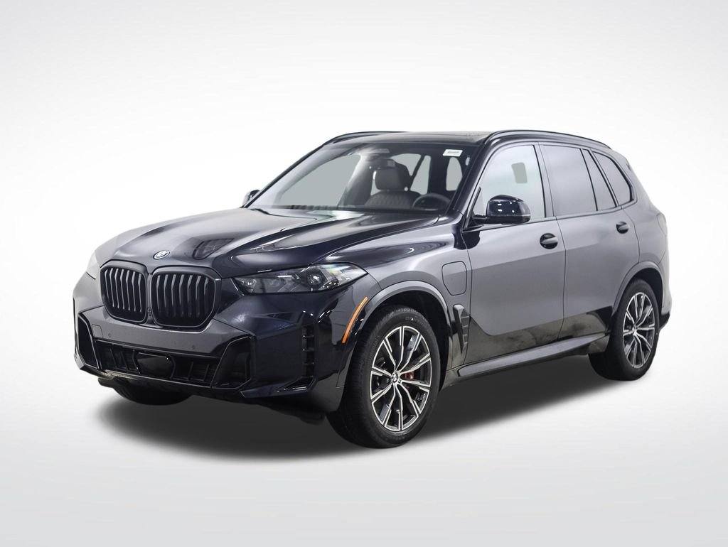 Used 2026 Carbon Black Metallic BMW xDrive50e image 1