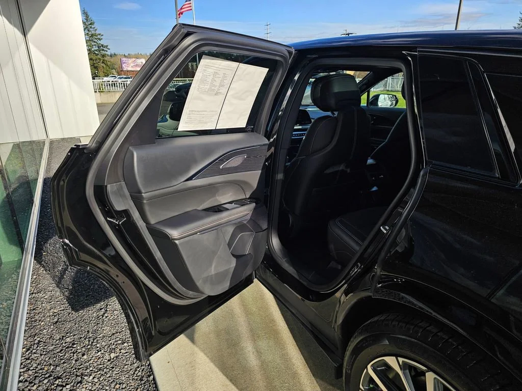 Used 2025 Stellar Black Metallic Cadillac Sport 2 image 16