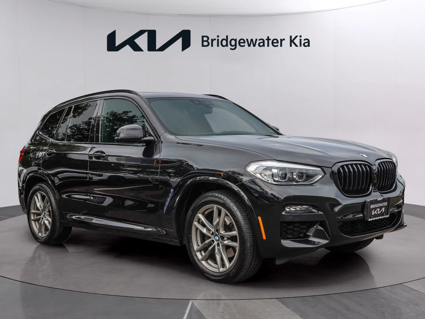 Used 2021 Black Sapphire Metallic BMW xDrive30i image 1