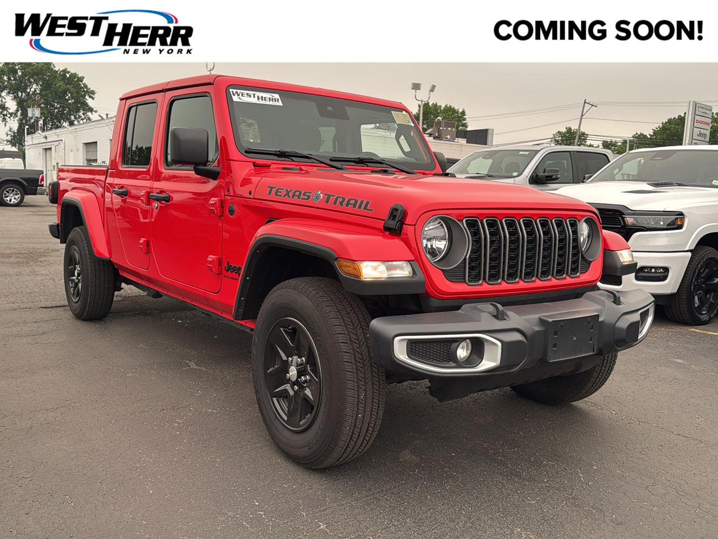 Used 2025 Firecracker Red Clearcoat Jeep Texas Trail image 1