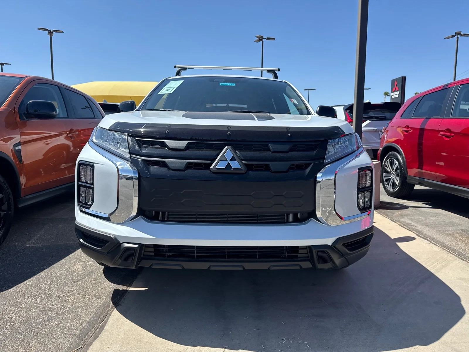Used 2025 White Diamond Mitsubishi Trail Edition image 2