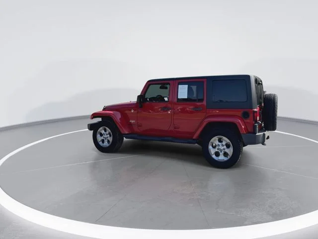 Used 2014 Red Jeep Unlimited Sahara image 7