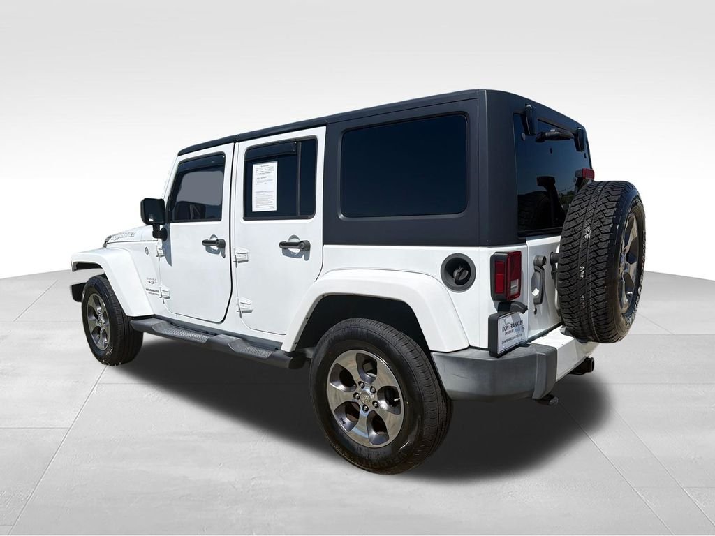 Used 2016 White Jeep Unlimited Sahara image 3