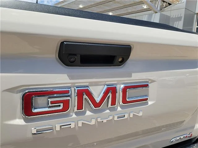 Used 2026 Tan GMC AT4 4x4 Crew Cab 5 ft. box 131 in. WB image 6