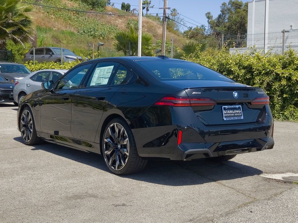 New 2026 Black Sapphire Metallic BMW 550e xDrive image 17