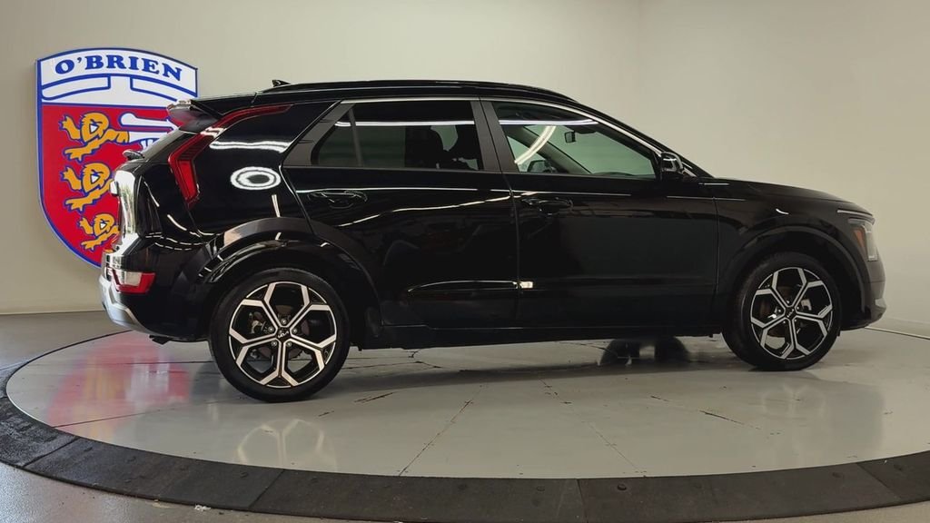 Used 2023 Aurora Black Kia EX Touring image 4