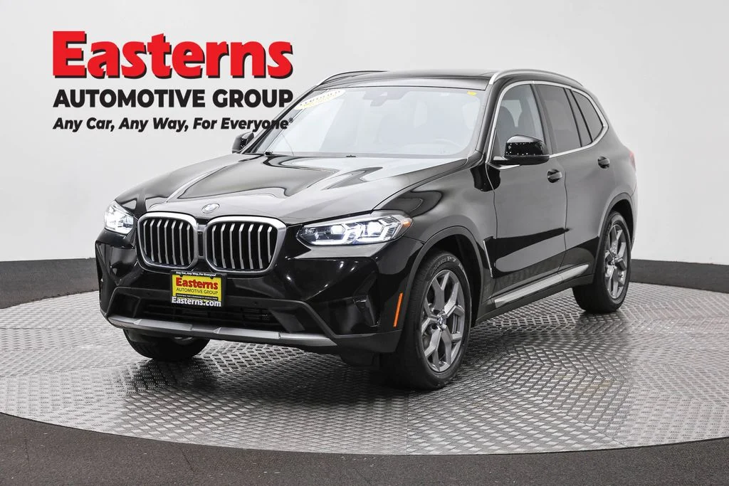 Used 2024 Black BMW xDrive30i image 1