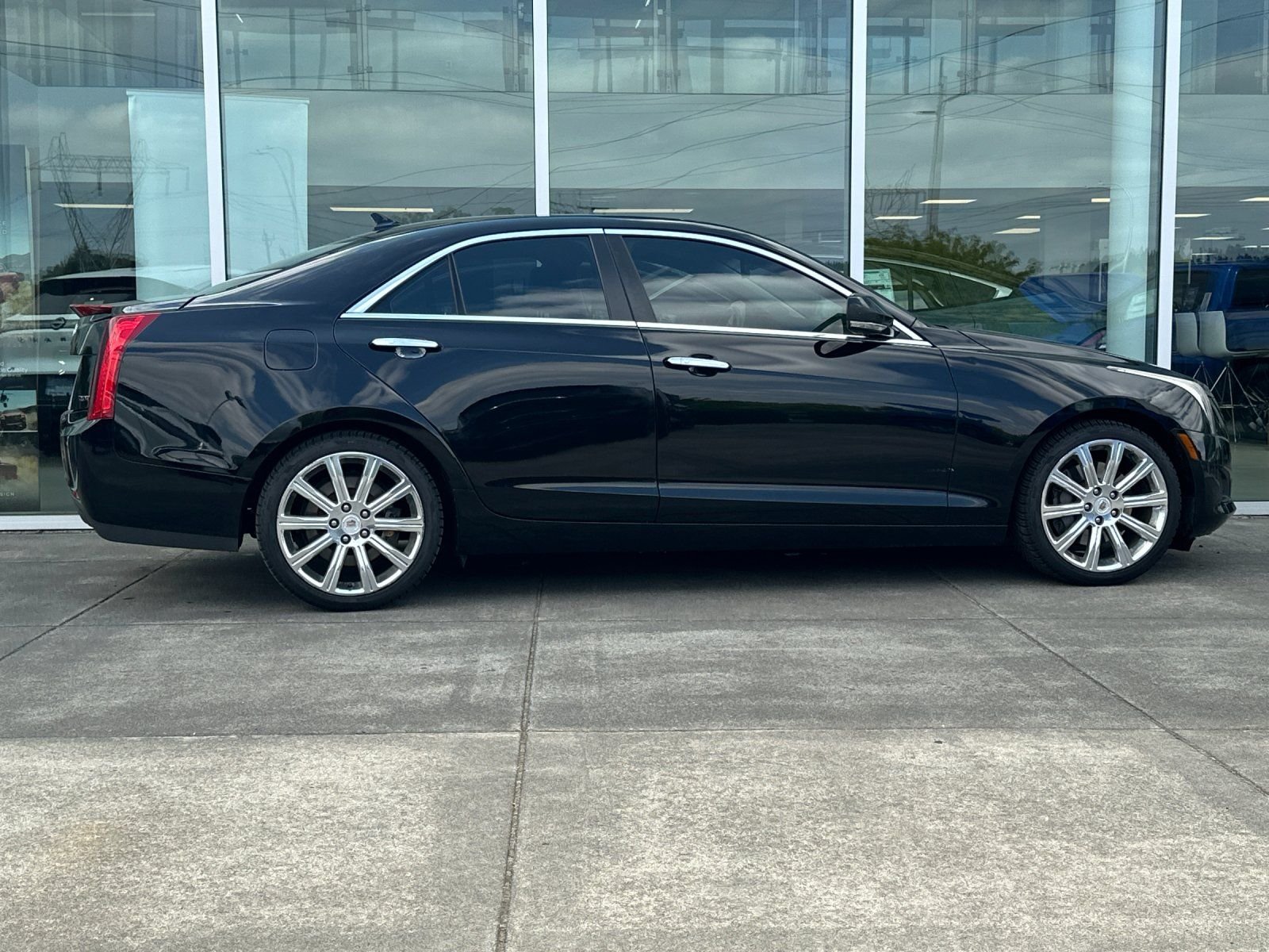 Used 2013 Black Raven Cadillac 2.0L Turbo Luxury image 1