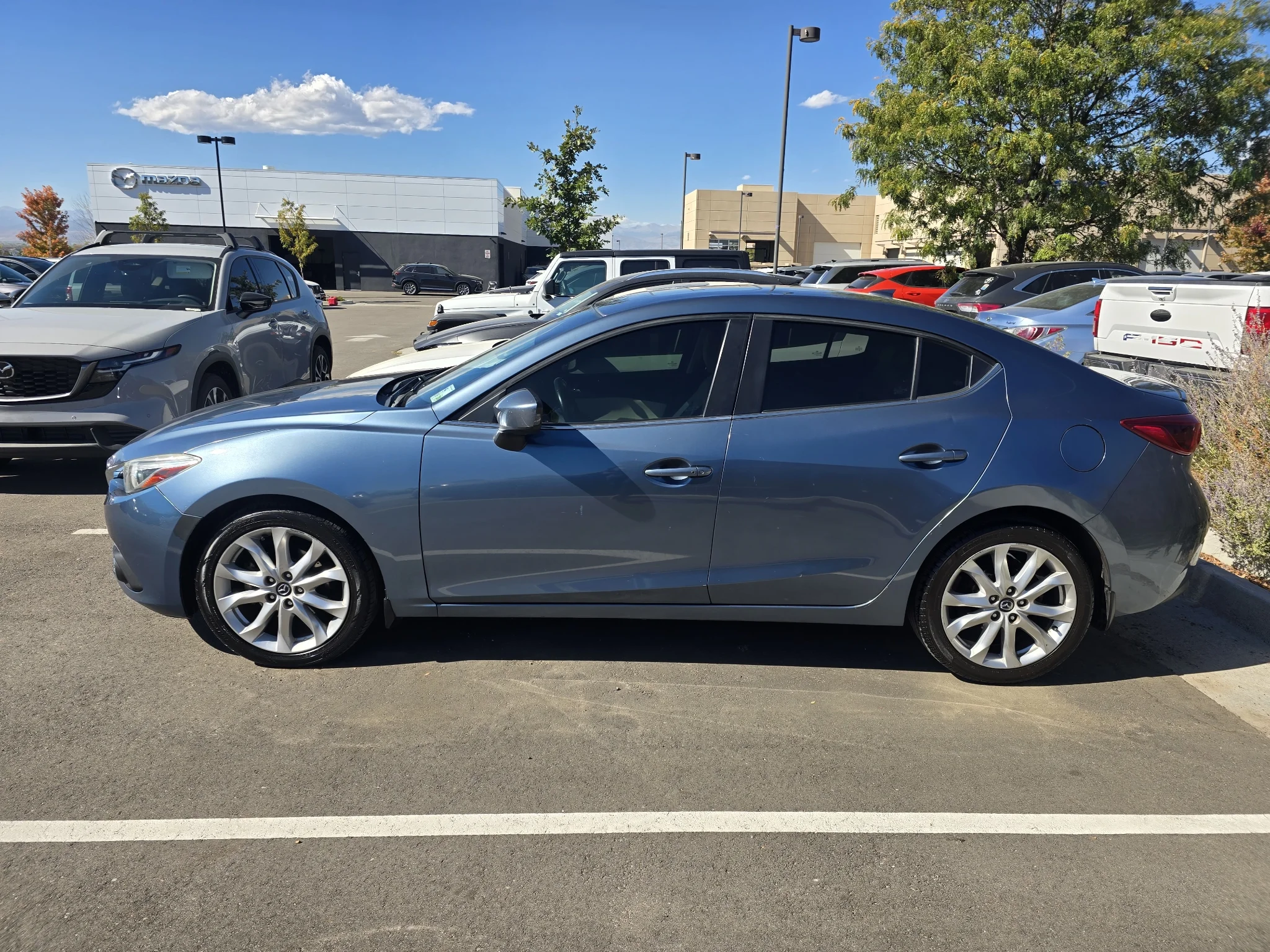 Used 2015 Mazda MAZDA3 s Grand Touring with VIN JM1BM1W33F1232034 for sale in Loveland, CO