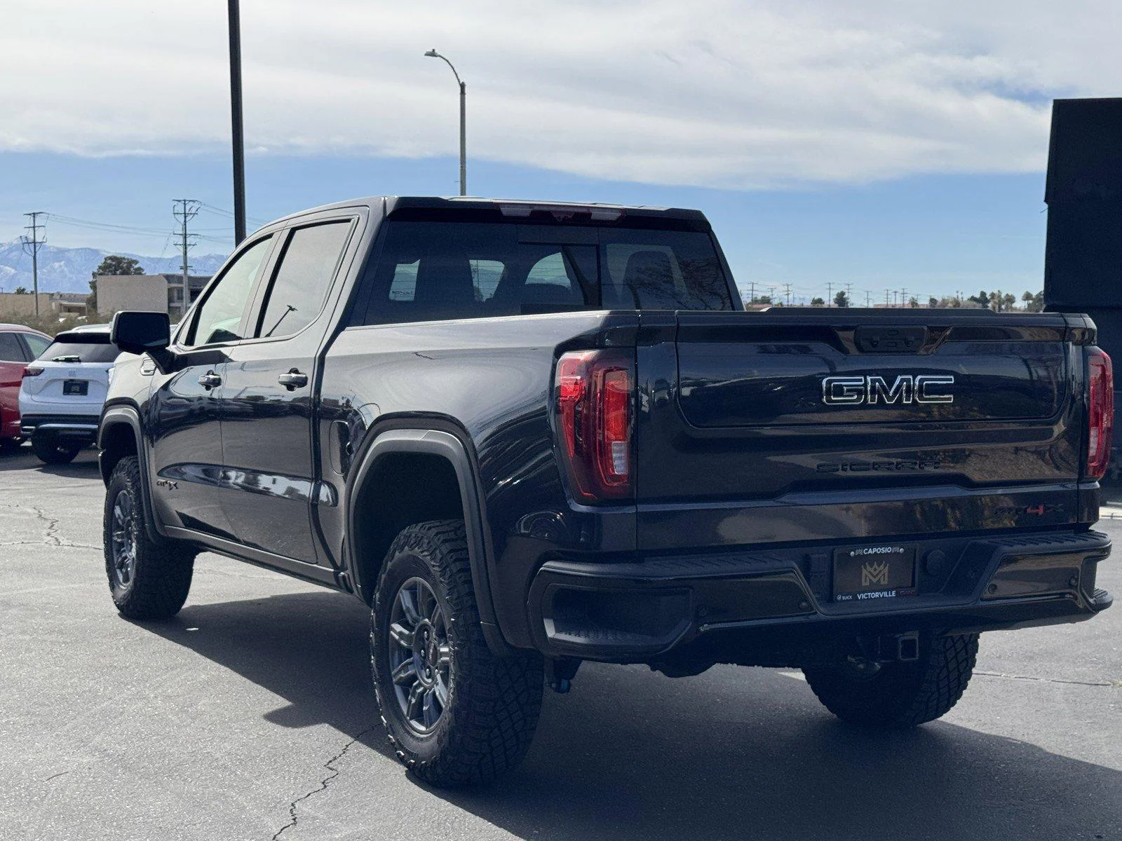 New 2026 TITANIUM RUSH METALLIC GMC AT4X image 4