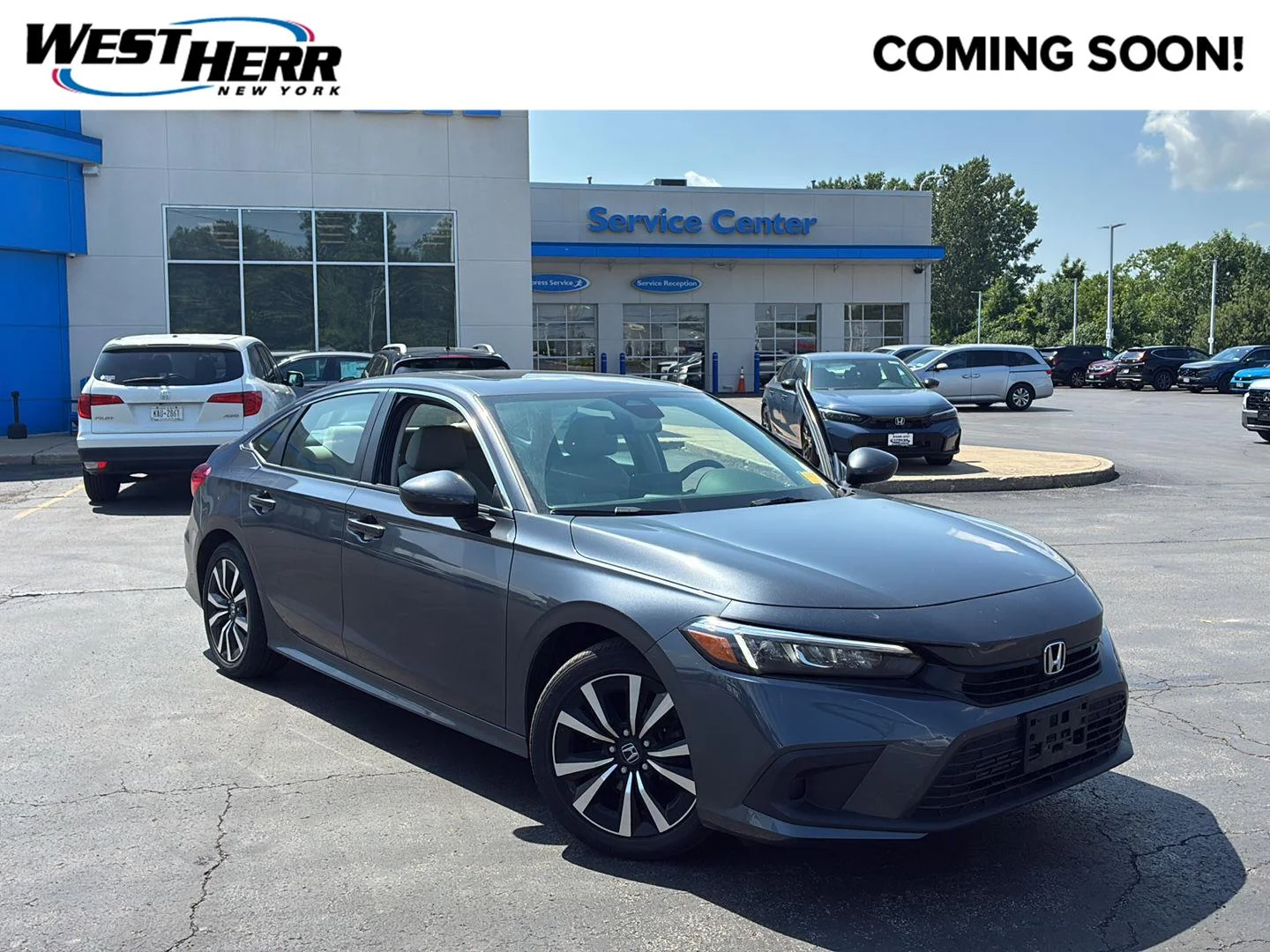 Used 2024 Meteorite Gray Metallic Honda EX image 1