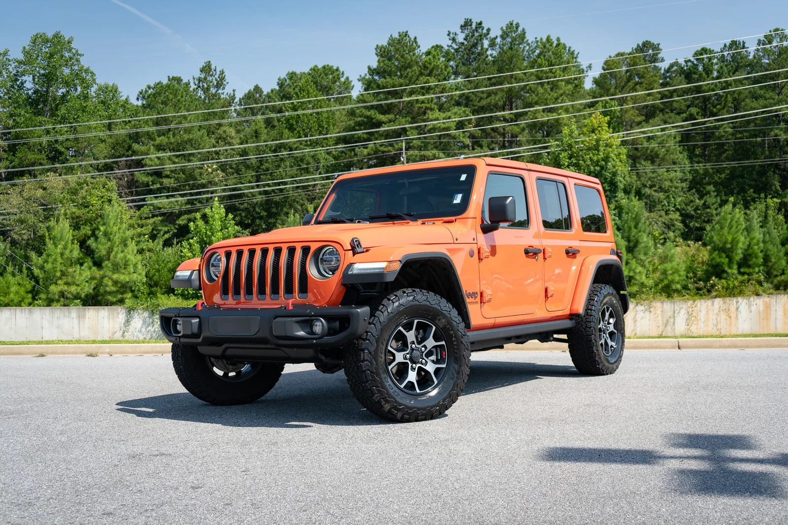 Used 2019 Orange Jeep Unlimited Rubicon image 1