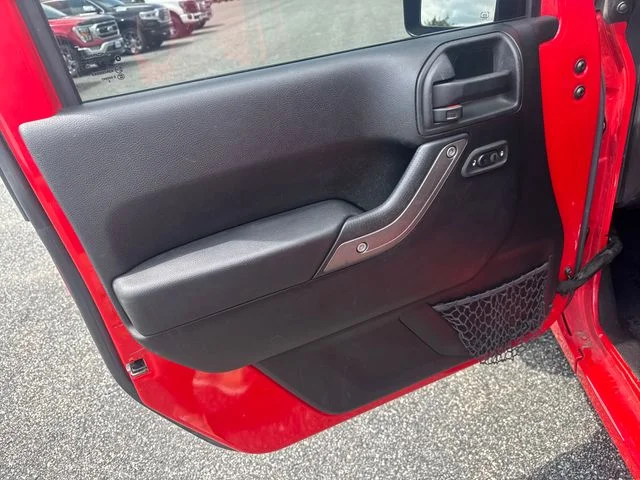 Used 2017 Firecracker Red Clearcoat Jeep Unlimited Sport image 16
