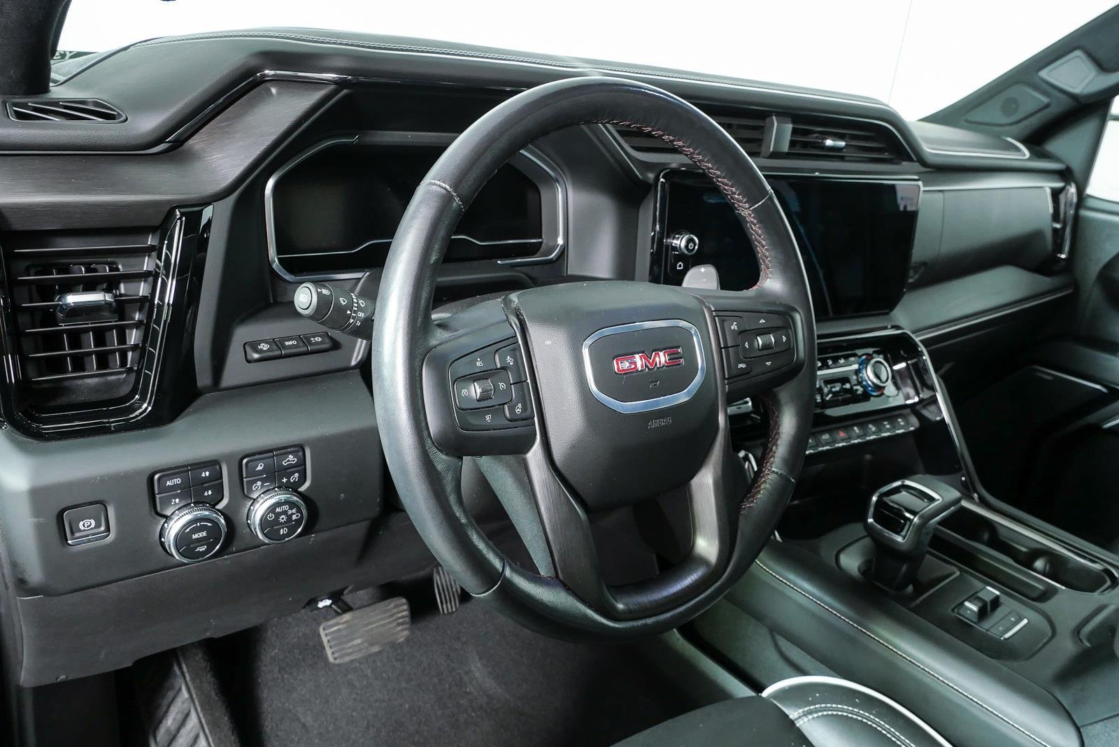 Used 2024 Titanium Rush Metallic GMC AT4X image 4
