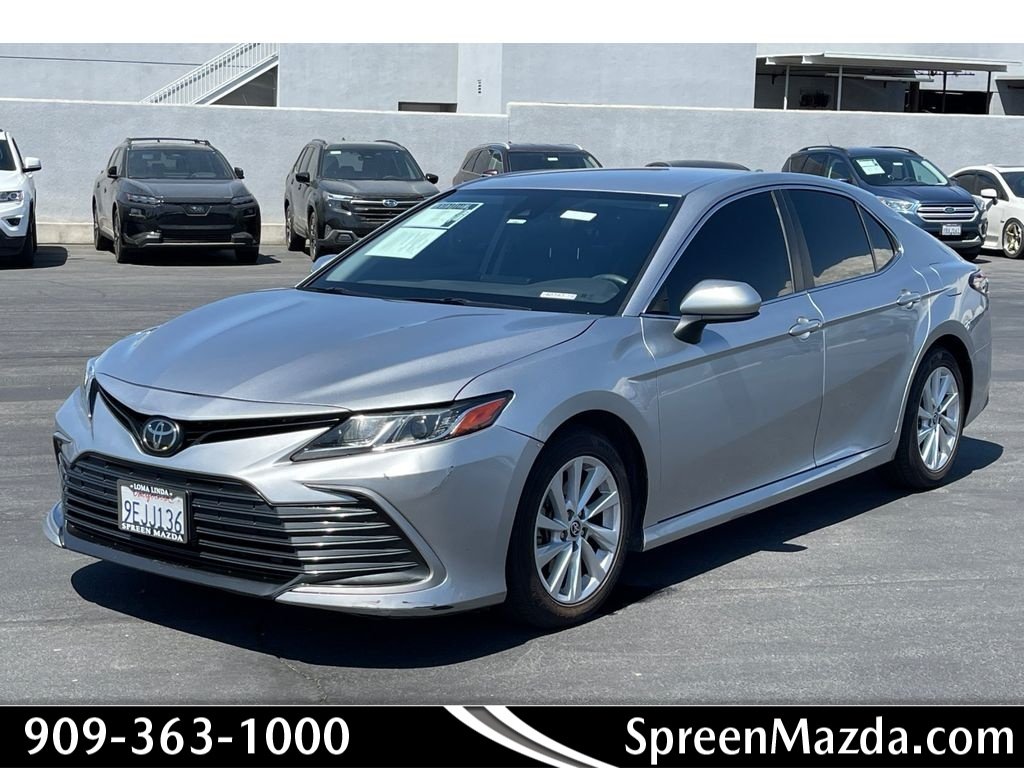 Used 2023 Celestial Silver Metallic Toyota LE image 1