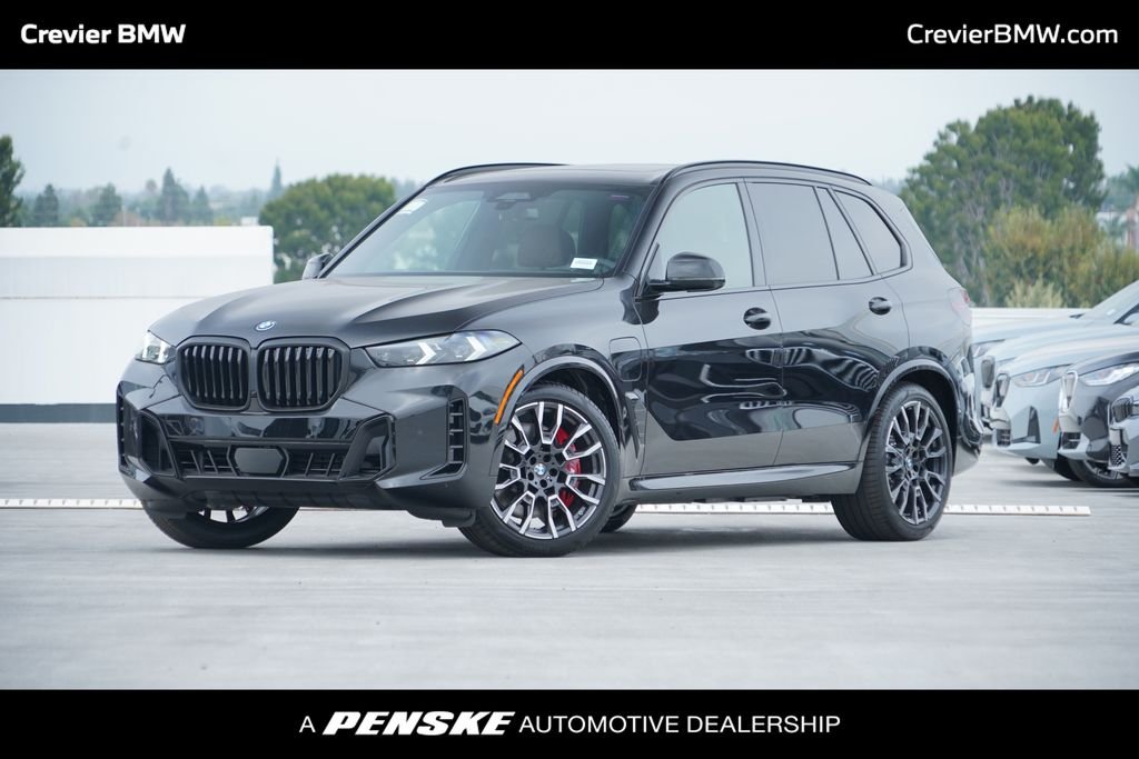 New 2026 Black Sapphire Metallic BMW xDrive50e image 1