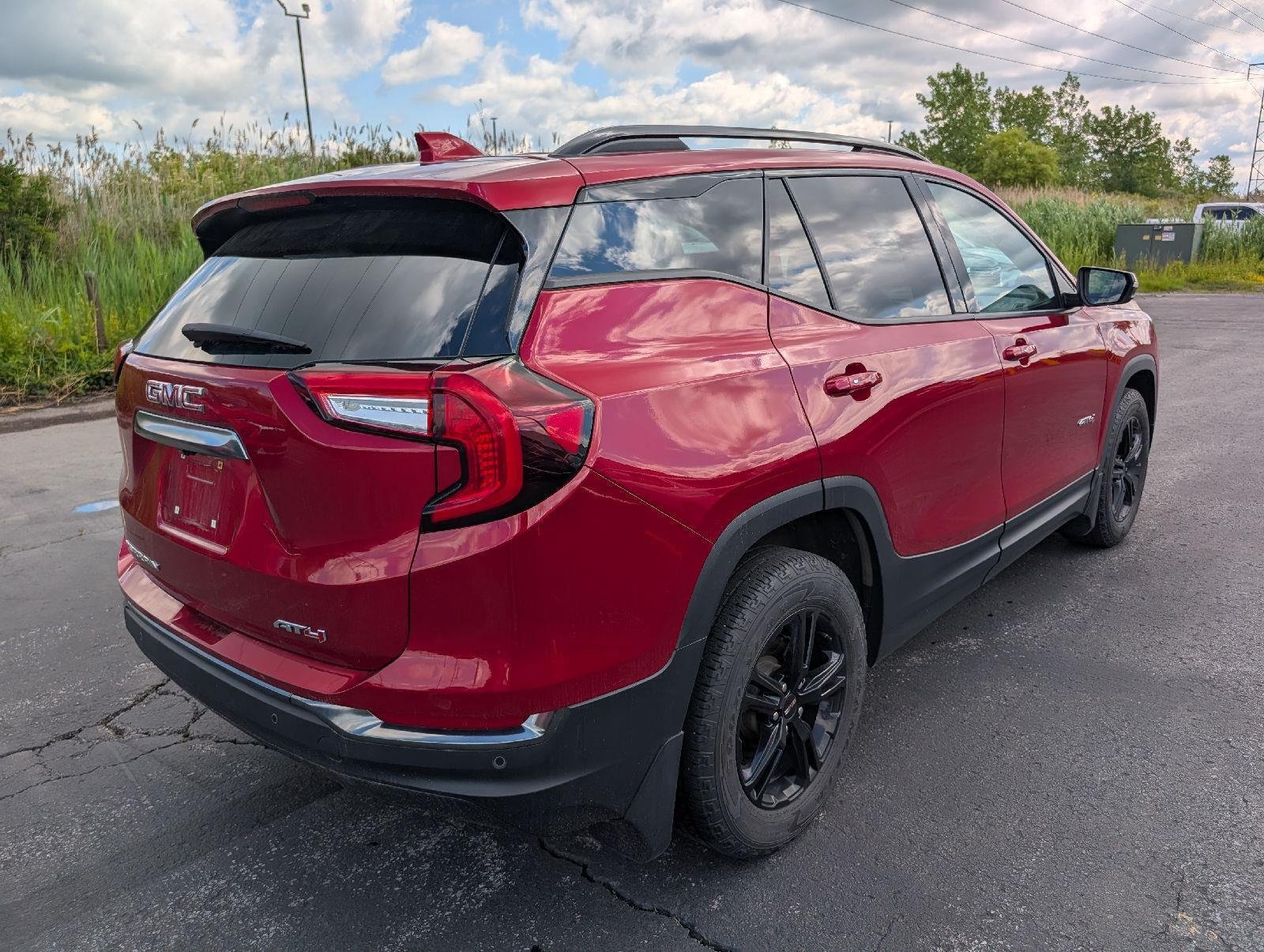 Used 2024 Volcanic Red Tintcoat GMC AT4 image 7