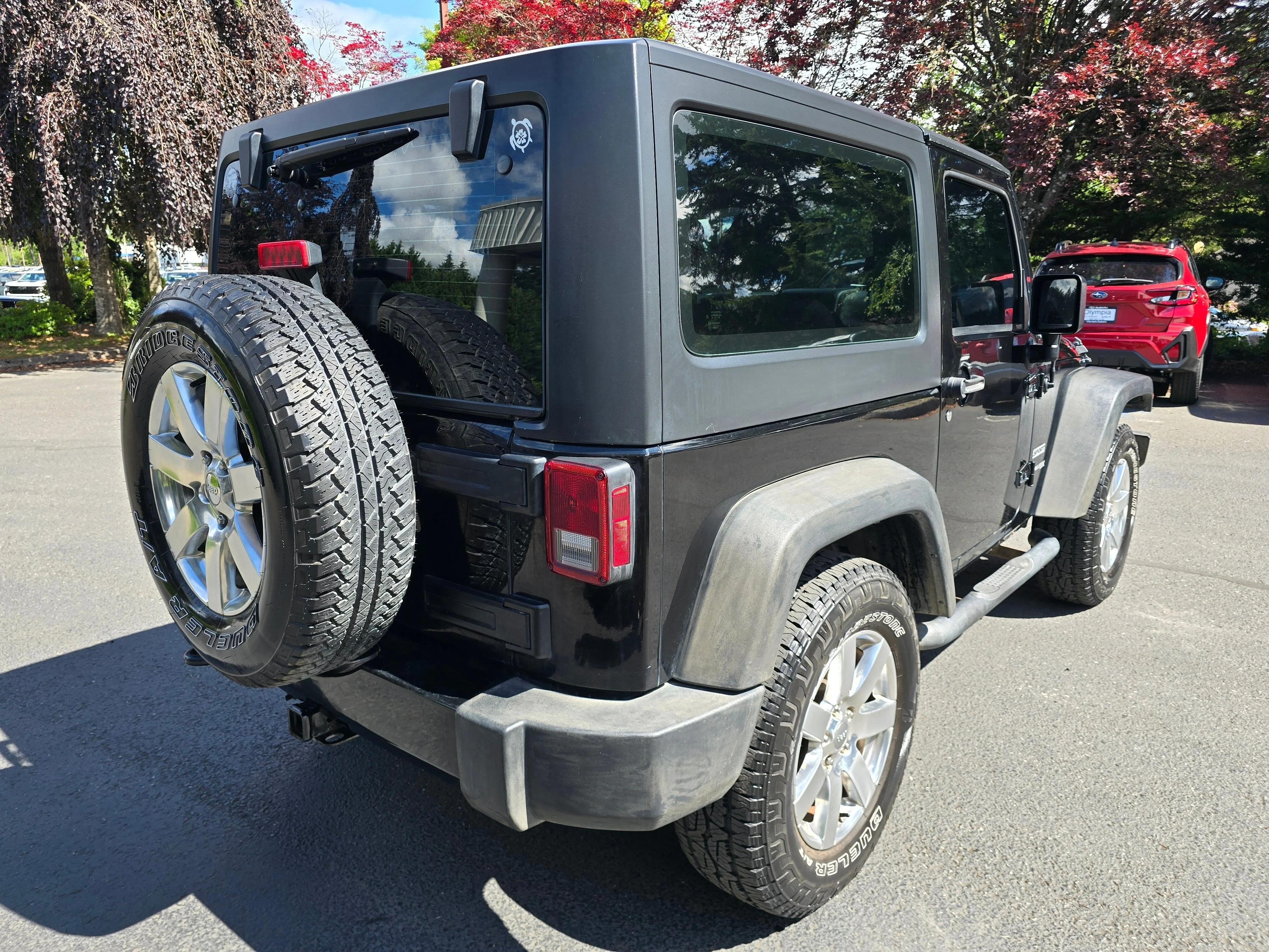 Used 2018 Black Clearcoat Jeep Sport image 4