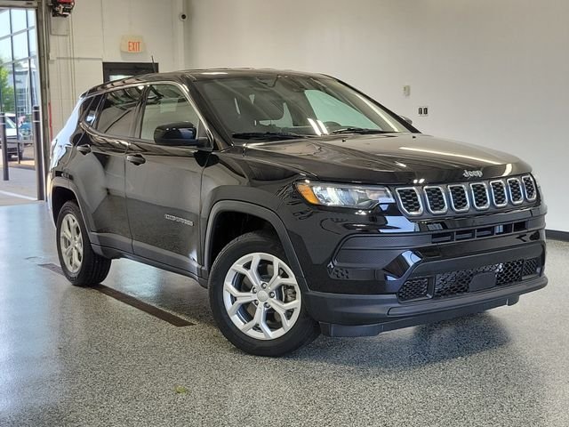 Used 2024 Black Jeep Sport image 1
