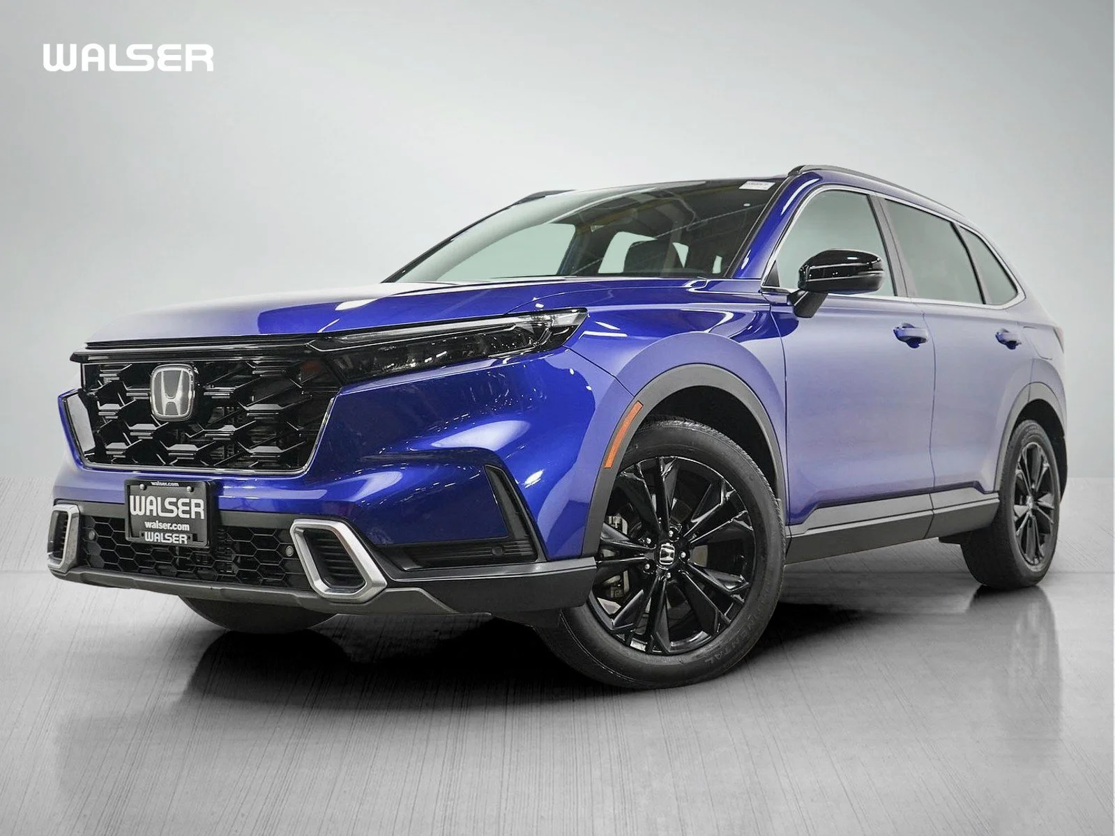 Used 2024 Blue Honda Sport Touring AWD image 1