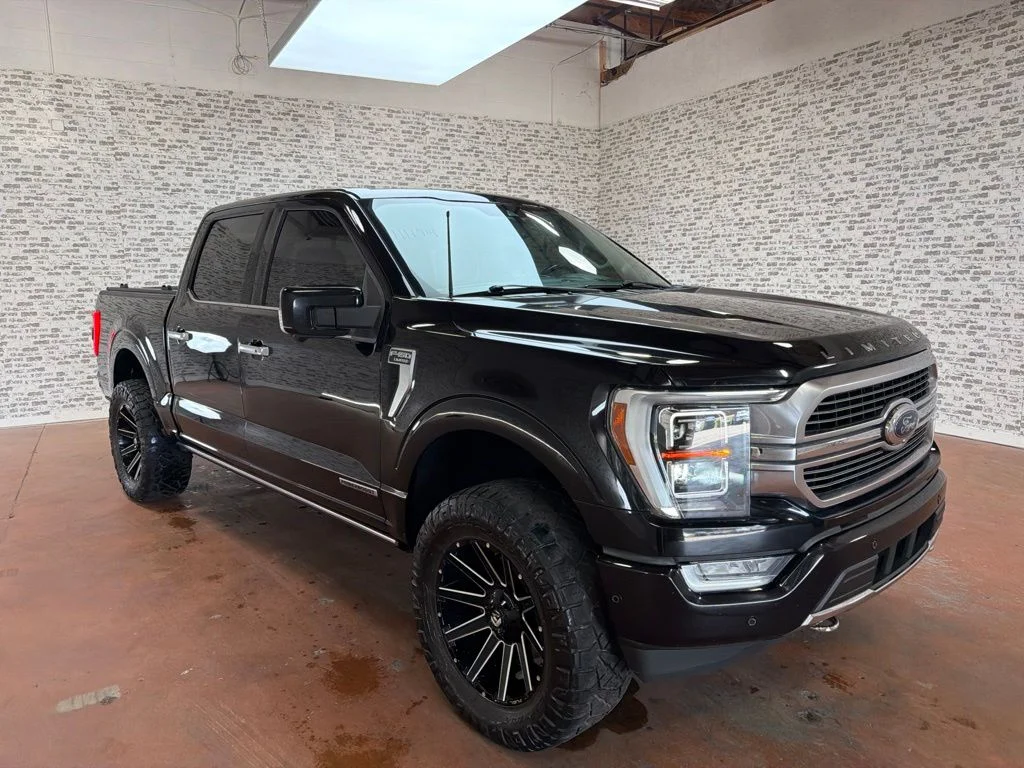 Used 2021 Agate Black Metallic Ford Limited image 1